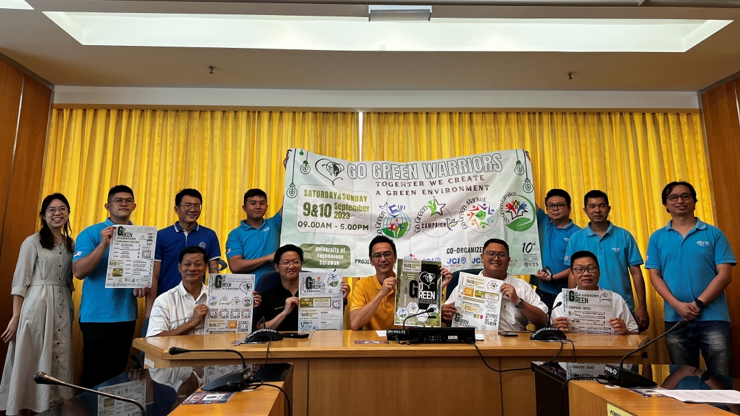 Wee (standing, left) and others in a photo-call for the ‘Go Green Warriors’ programme.