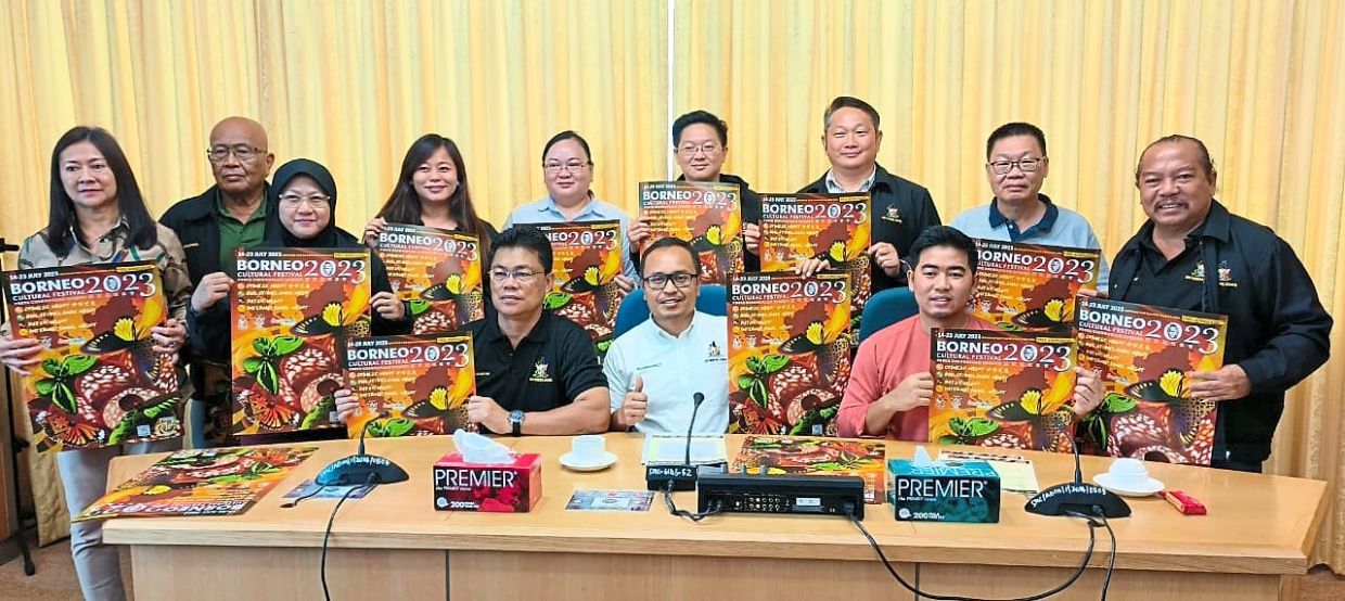 Mohammed Abdullah (seated centre) and organising committee members promoting the Borneo Cultural Festival.