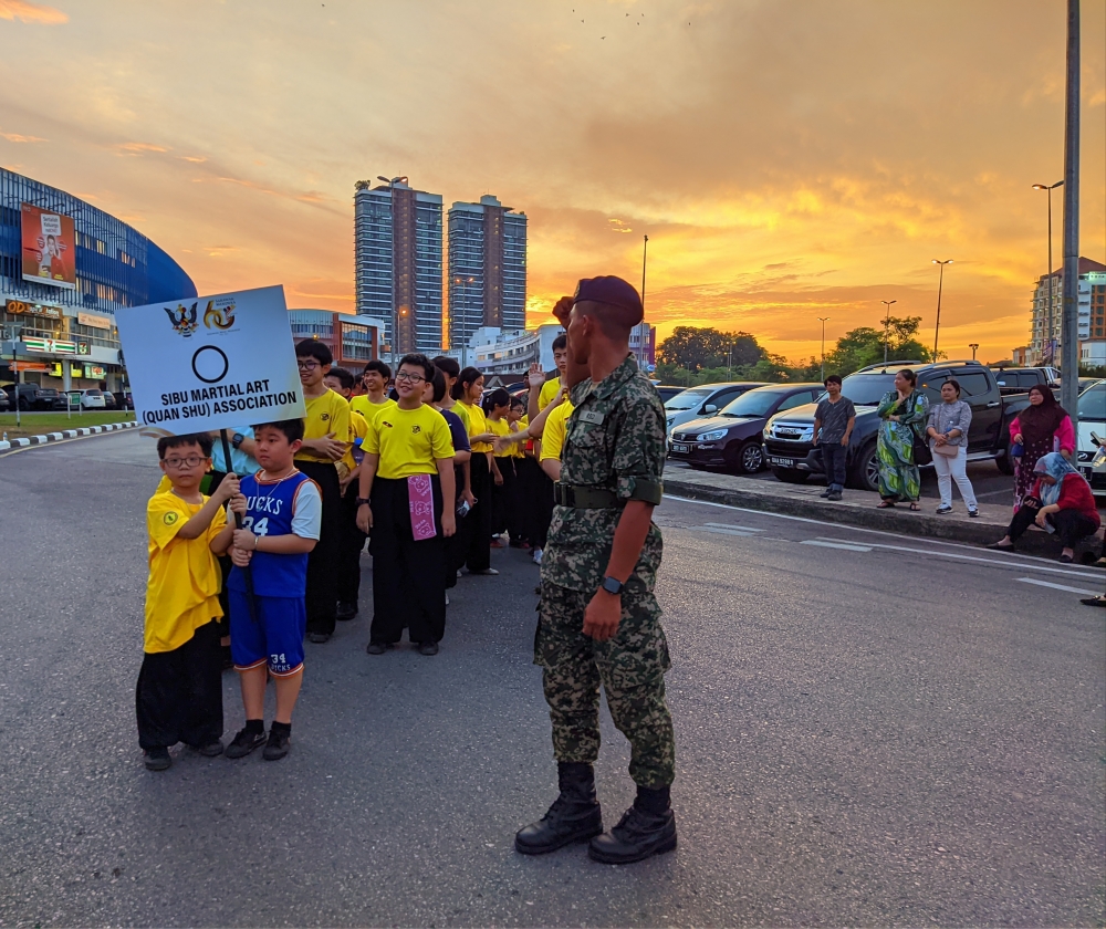 Sibu Martial Art (Quan Shu) Association joins the Sibu Street Parade rehearsal tonight. – Photo by Peter Boon