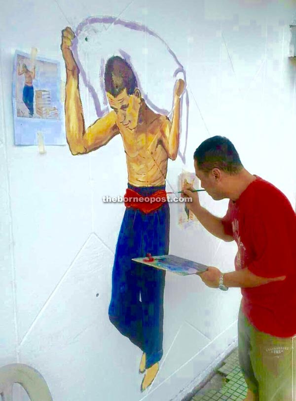 The wall painting tells the story of coolies who contributed to the building of Sibu as the commercial hub of Sarawak.