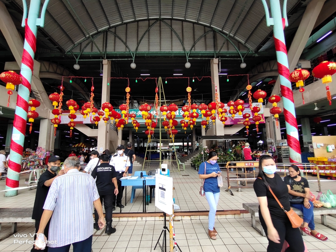 Colourful lanterns put up at Sibu Central Market create the festive mood with the Lunar New Year just weeks away. – Photo by Peter Boon