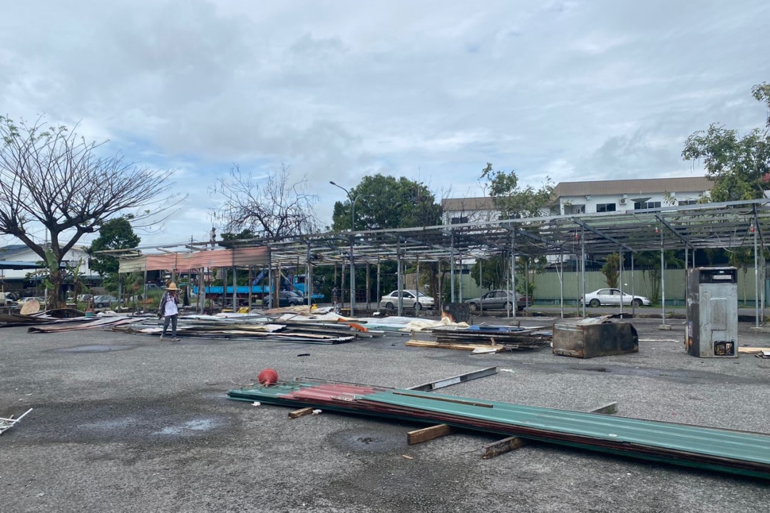 Demolition works in progress at the temporary stalls at Jalan Tapang here. – Photo via Whatsapp/Albert Tiang