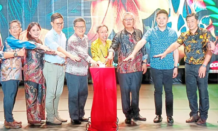 (From third left) Ling, Chieng, Dr Sim, Ting and other councillors declaring open BCF 2024.