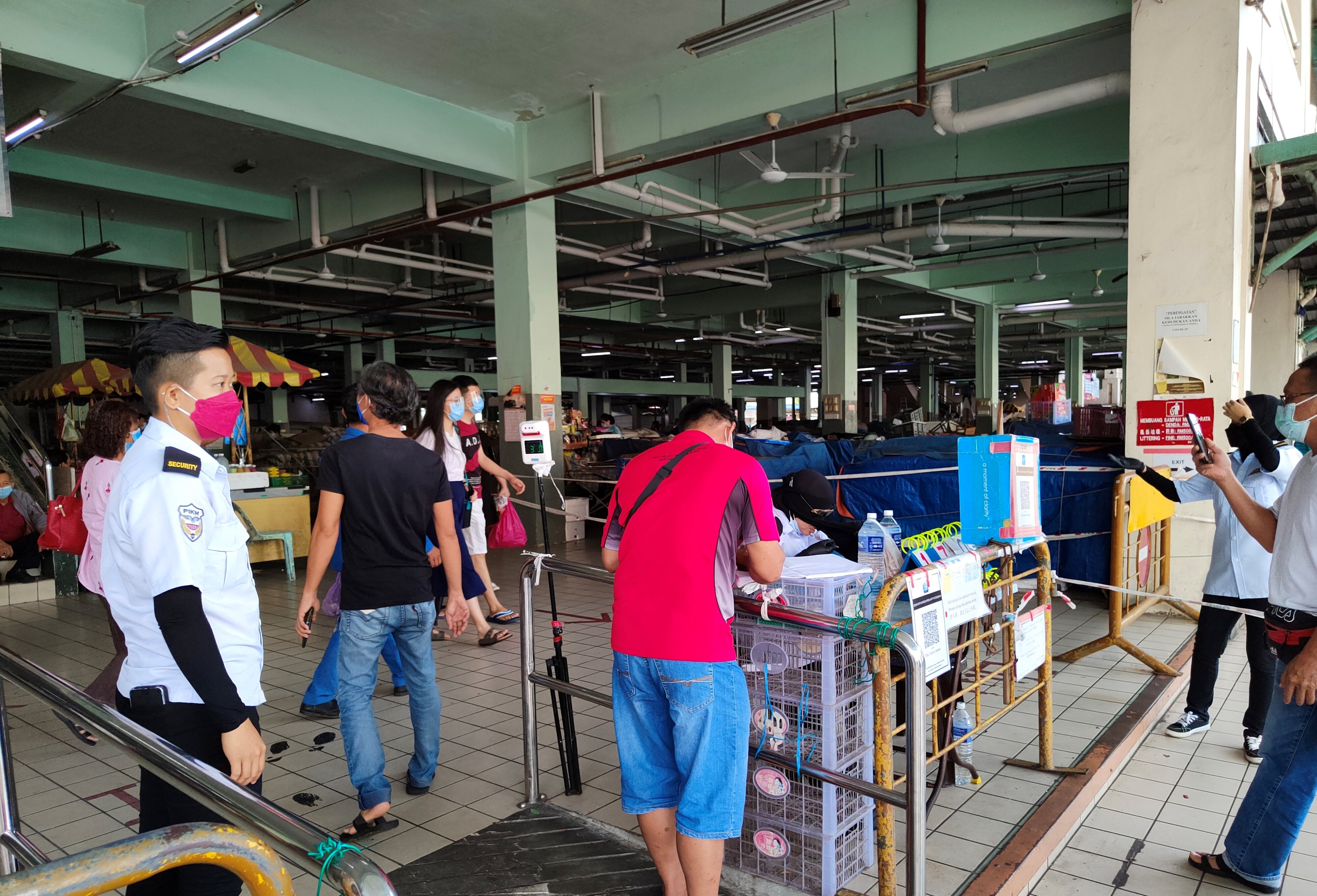 File photo shows customers at the Sibu Central Market.